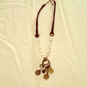 Silpada black leather, pearl and charm necklace.
