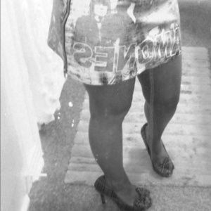 "Ramones" leather skirt with zip up sides.