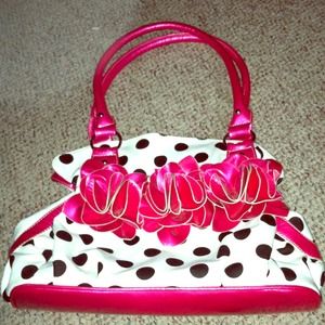 Cute black polka dot white and pink purse.