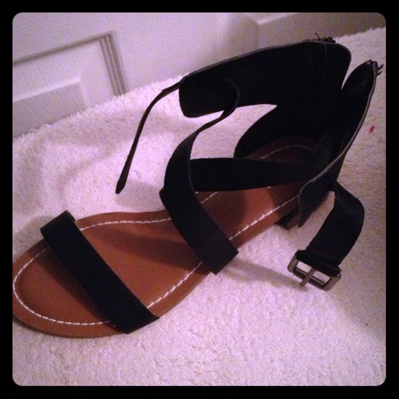 Black sandals.