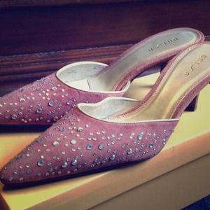 A pair of Unisa close toe open back pumps