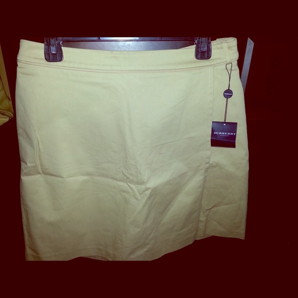 Tan Burberry skirt/shorts combo!