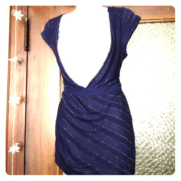 Blue top with gold lines stitched throughout