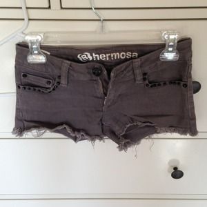 Grey shorts with black studs