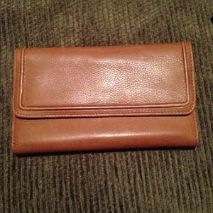 Light brown wallet.
