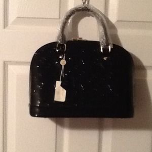 Black and pink patent leather bag
