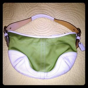 Authentic green coach shoulder purse.