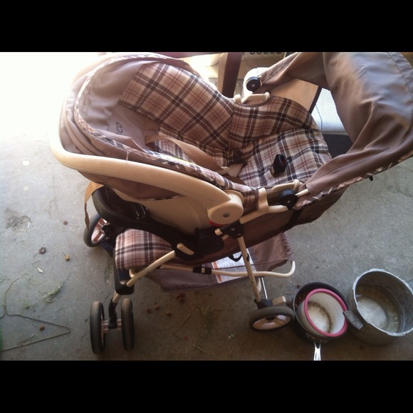 A Cosco unisex stroller w carseat