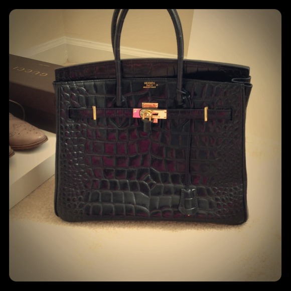 On hold Crocodile style leather H bag
