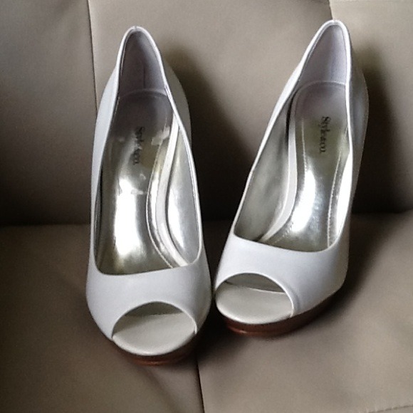 White open toe pumps