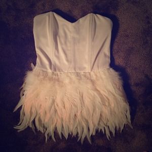 Strapless feather accented top