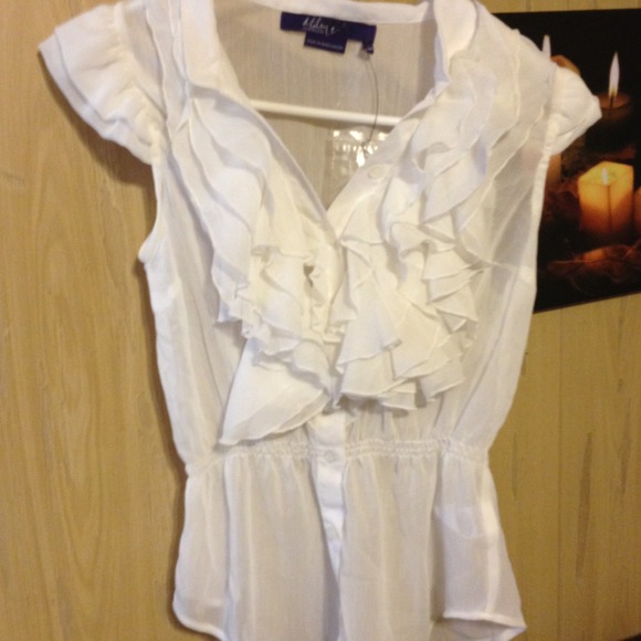 White ruffle top by Miley Cyrus