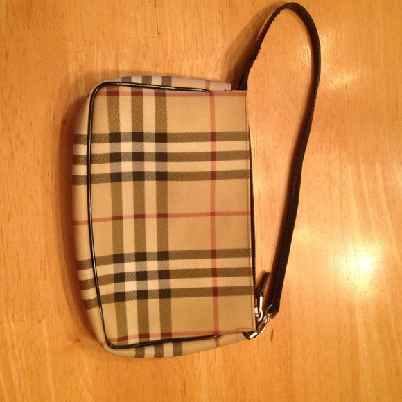 Gently used canvas Burberry clutch bag