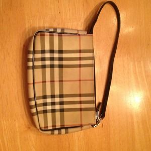 Gently used canvas Burberry clutch bag