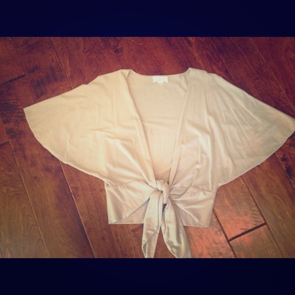 Beige colored shrug