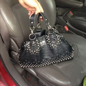 Black leather coach purse with silver studs