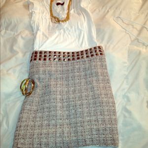 High waisted skirt with gold stud top.