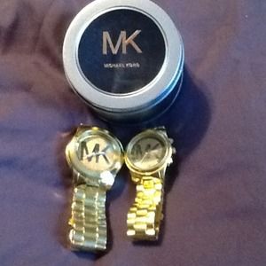 His & hers gold MK watches