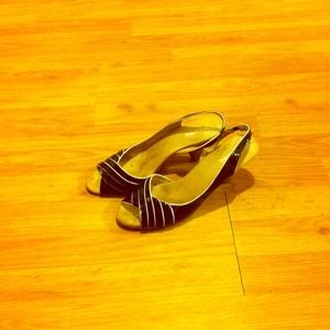 Black and white sandals.