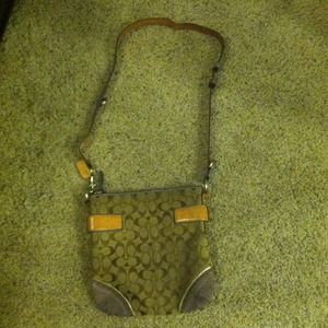 Purple/Tan Coach purse.