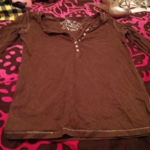 A brown long sleeve shirt