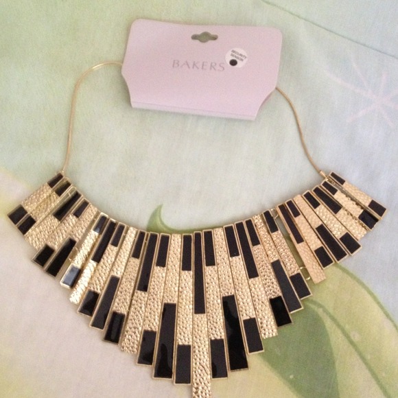 Brand new Gold and black necklace