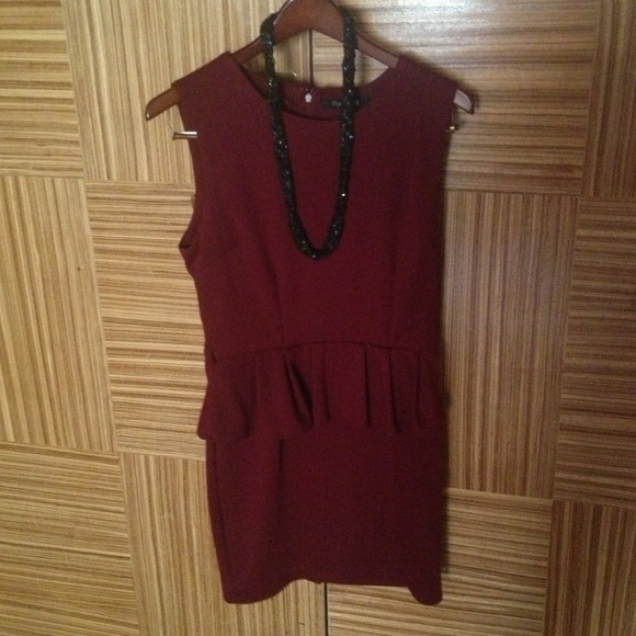 Burgundy color peplum dress