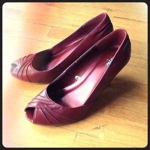 Red leather pumps