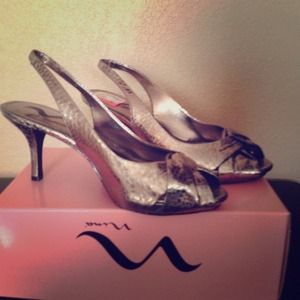 Size 8 1/2 Snakeskin heels.