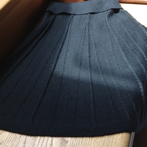 Black knitted A-silhouette skirt. "SOLD"