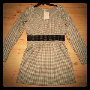 Studded grey, black, and white dress.