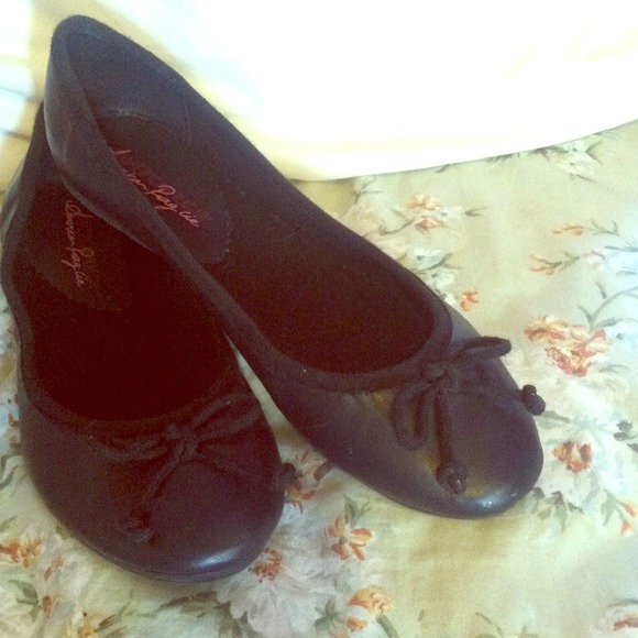 Black ballerina flats with bow