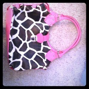 Large leather pink and cow print purse.