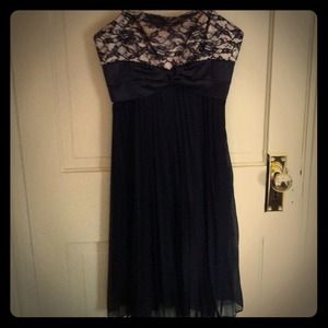 Pleated bottom and lace top dress