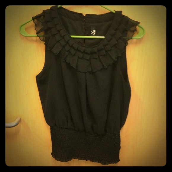 Black ruffled professional top
