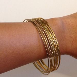 Gold bangles for arm candy