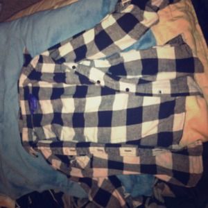 Selling a beautiful black and white shirt