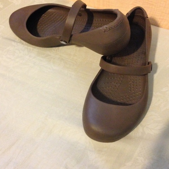 Brand new, never worn Croc sandal. Dark Brown