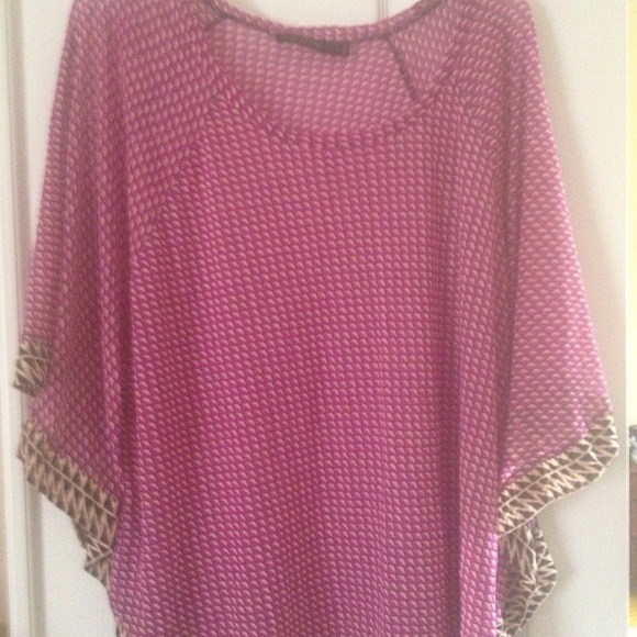 Loose fitting, sheer blouse.  Love this!!