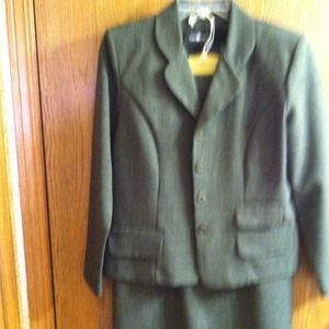 NEW 3piece suit. Long skirt,slacks,and jacket.