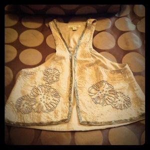 Adorable taupe overlay top with a bit of sparkles.