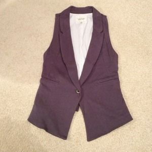 Small grey Heritage 1981 vest with button closure.