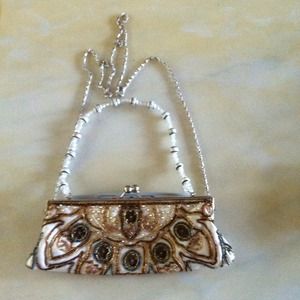 BRAND NEW Beautiful Beaded Clutch. NEGOTIABLE!