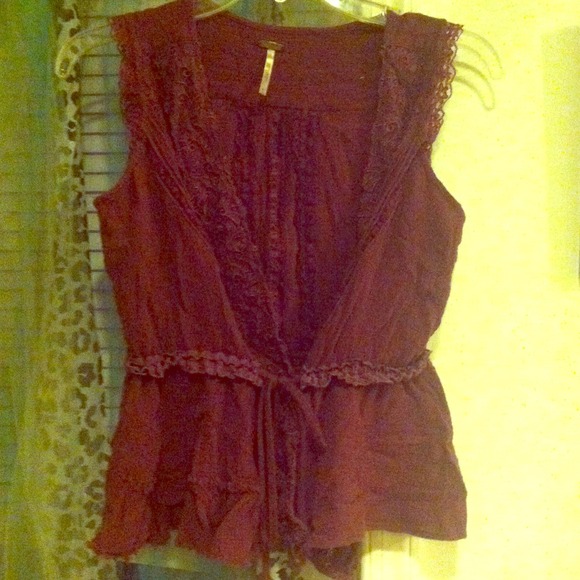 Sleeveless vest with ties