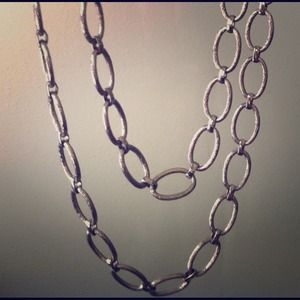 Metal links extra long necklace.