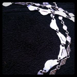 Set of silver metal linked extra long necklaces