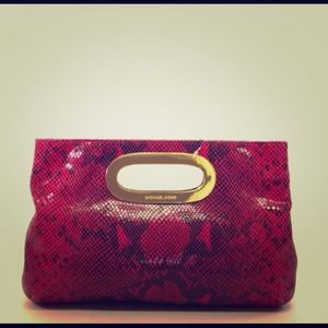 Authentic hot pink Michael kors python clutch