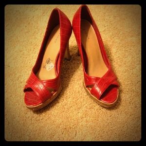 Red snakeskin heels