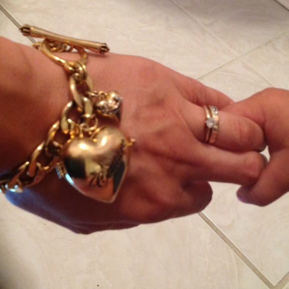 SOLD!Juicy couture  lipgloss heart charm bracelet.