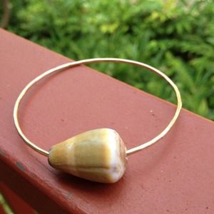 SOLD.Gold cone shell bangle